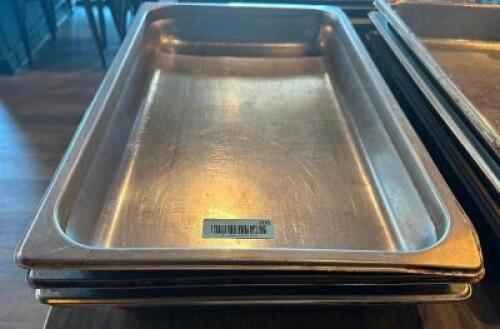 (4) FULL SIZE STAINLESS INSERTS.