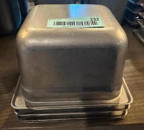 (4) 1/6 SIZE STAINLESS INSERTS.