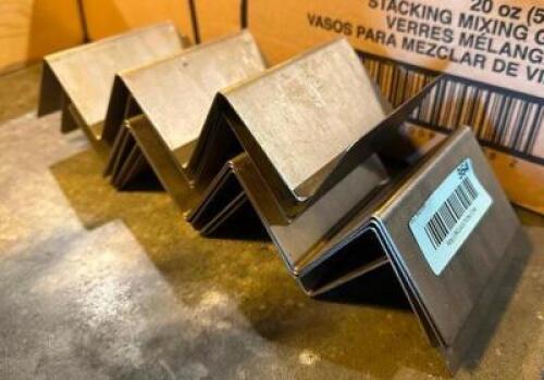 (6) STAINLESS TACO STANDS.
