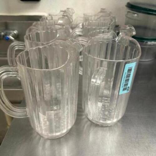 (8) 64 OZ PLASTIC PITCHERS.