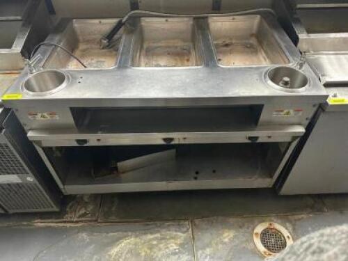 DESCRIPTION: RANDELL THREE WELL ELECTRIC STEAM TABLE. BRAND / MODEL: RANDEL 3613-240 ADDITIONAL INFORMATION 208 VOLT, 1 PHASE. LOCATION: KITCHEN QTY: