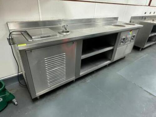 DESCRIPTION: 102" STAINLESS COUNTER W/ FREEZER WELL AND (2) DROP IN HEATED SOUP CROCK WELLS SIZE 102" LOCATION: KITCHEN QTY: 1