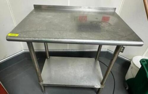 DESCRIPTION: 36" X 24" STAINLESS TABLE ADDITIONAL INFORMATION W/ 1" BACK SPLASH SIZE 36" X 24 LOCATION: KITCHEN QTY: 1