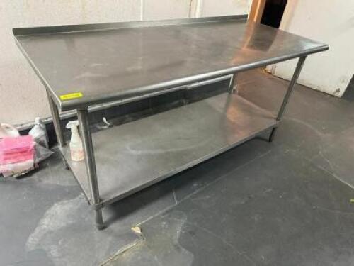 DESCRIPTION: 72" X 30" STAINLESS TABLE. ADDITIONAL INFORMATION W/ 1" BACK SPLASH SIZE 72" X 30" LOCATION: KITCHEN QTY: 1