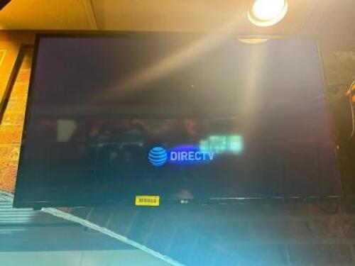 DESCRIPTION: 40" LG FLAT SCREEN TV W/ WALL MOUNT BRAND / MODEL: LG SIZE 40" LOCATION: BAR QTY: 1