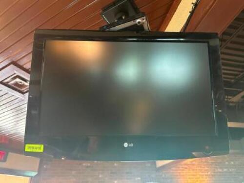DESCRIPTION: 32" LG FLAT SCREEN TV W/ WALL MOUNT BRAND / MODEL: LG SIZE 32" LOCATION: BAR QTY: 1