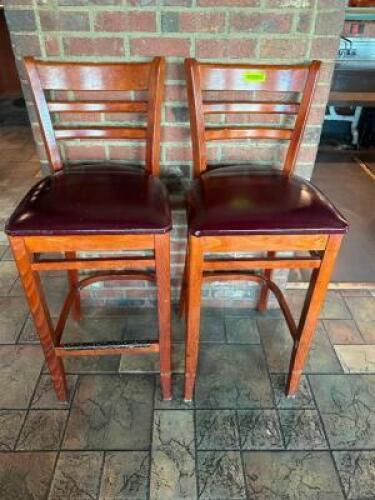 DESCRIPTION: (2) 30" LADDER BACK WOODEN BAR STOOLS W/ MAROON PADDED SEATS LOCATION: BAR THIS LOT IS: SOLD BY THE PIECE QTY: 2