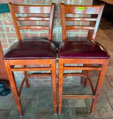 DESCRIPTION: (2) 30" LADDER BACK WOODEN BAR STOOLS W/ MAROON PADDED SEATS LOCATION: BAR THIS LOT IS: SOLD BY THE PIECE QTY: 2
