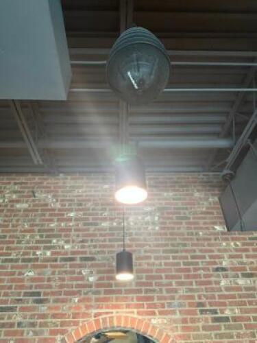 DESCRIPTION: (9) BLACK CYLINDER PENDANT LIGHTS. ADDITIONAL INFORMATION LADDER REQUIRED FOR REMOVAL LOCATION: SIDE SEATING THIS LOT IS: SOLD BY THE PIE