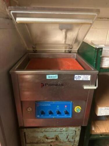 PROMARKS VACUUM SEALER W/ VACUUM BAGS AND SHELF.