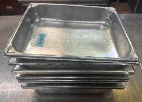 (6) HALF SIZE STAINLESS INSERTS.
