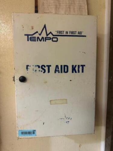 WALL MOUNTED FIRST AID KIT W/ SOME CONTENTS.