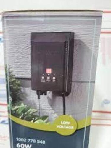 DESCRIPTION: (1) 60W DIGITAL LANSCAPE LIGHTING TRANSFORMER BRAND/MODEL: HAMPTON BAY 1002 770 548 INFORMATION: BUILT IN SURGE PROTECTION RETAIL$: $45.0