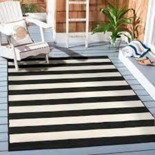 DESCRIPTION: (1) AREA RUG BRAND/MODEL: BETTER HOMES AND GARDENS INFORMATION: IBIZ, BLACK AND WHITE SIZE: 9' X 12' RETAIL$: $168.00 EA QTY: 1