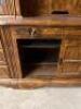 DESCRIPTION: WOODEN L-SHAPED OFFICE DESK WITH LIGHTED HUTCH INFORMATION: SEE PHOTOS FOR MORE DETAIL SIZE: 113"X82"X24"X78.5" QTY: 1 - 7