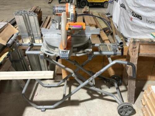 NAME: 12" COMPOUND MITER SAW WITH ROLLING BASE DESCRIPTION: 12" COMPOUND MITER SAW WITH ROLLING BASE BRAND / MODEL: RIDGID THIS LOT IS: ONE MONEY QTY: