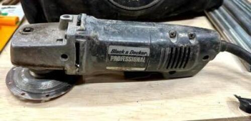 DESCRIPTION: ELECTRIC ANGLE GRINDER WITH CASE BRAND/MODEL: BLACK AND DECKER INFORMATION: CORD IS DAMAGED QTY: 1