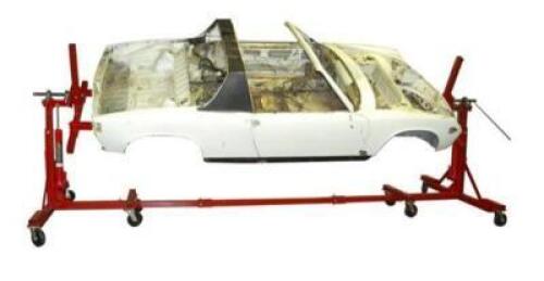 DESCRIPTION: (1) MERRICK AUTO DOLLY ROTISSERIES BRAND/MODEL: M998128 INFORMATION: RED/LOAD CAPACITY: 3,000 LBS RETAIL$: $1,914.99 SIZE: [61"W X 44 TO