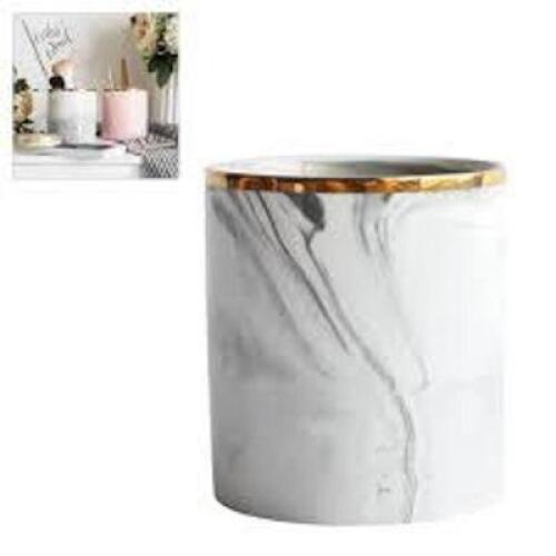 DESCRIPTION: (2) BOX OF (2) CANDLE HOLDER INFORMATION: CERAMIC SIZE: WHITE MARBLE RETAIL$: $35.78 EA QTY: 2