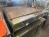 DESCRIPTION 48" THERMOSTATIC GAS FLAT GRILL. ADDITIONAL INFORMATION NATURAL GAS. SIZE 48" LOCATION BAY 6 QTY 1 - 2