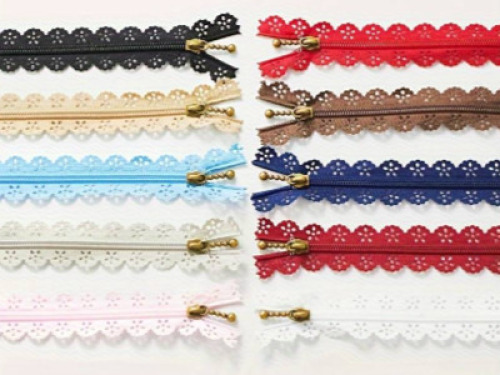 DESCRIPTION: (3) BAGS OF SEWING LACE ZIPPERS INFORMATION: MULTI COLORED RETAIL$: $8.79 PER BAG QTY: 3