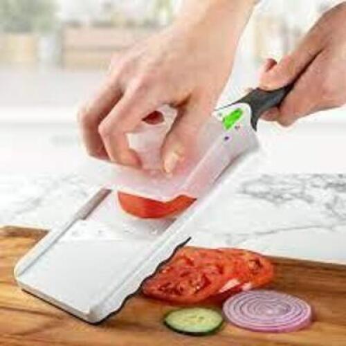 DESCRIPTION: (2) MANDOLINE SLICER BRAND/MODEL: PREP SOLUTIONS INFORMATION: WHITE SIZE: 5 BLADES INCLUDED RETAIL$: $13.97 EA QTY: 2