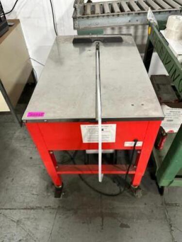AUTOMATIC PLASTIC STRAPPING MACHINE