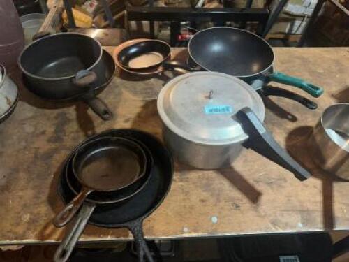 (1) LOT OF ASSORTED HOUSE HOLS SKILLETS AND SAUCE POTS.
