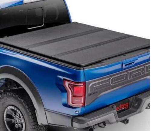 DESCRIPTION: (1) EXTANG SOLID FOLD 2.0 HARD TRI-FOLD COVER BRAND/MODEL: 1979888746 INFORMATION: BLACK/OVER BED RAILS/MUST COME INTO INSPECT CONTENTS R
