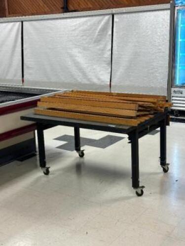 ROLLING MERCHANDISE TABLE WITH TILTING TOP AND ADJUSTABLE LEG HEIGHT