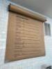 60" ROLLED PAPER DISPENSER W/ ROLL.