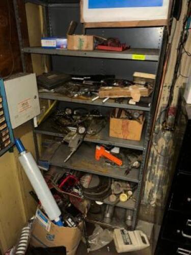 CONTENTS OF SHELF - ASSORTED PARTS AND HARDWARE.