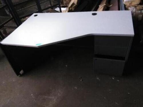 DESCRIPTION: (1) SINGLE PEDESTAL CORNER DESK INFORMATION: DARK GRAY AND WHITE RETAIL$: $745.99 EA QTY: 1