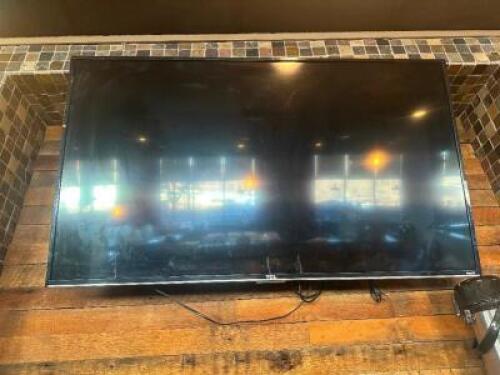 TCL 55" FLAT SCREEN TV W/ WALL MOUNT AND REMOTE.