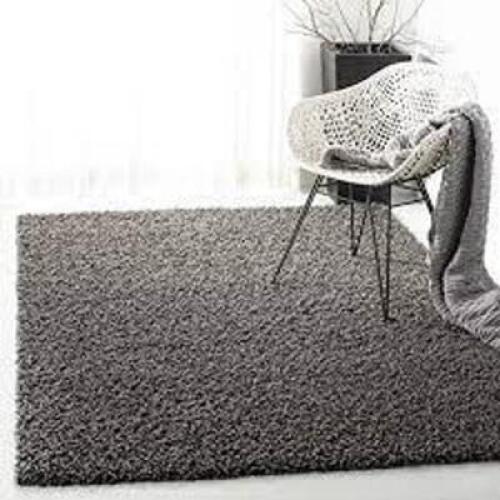 DESCRIPTION: (1) AREA RUG BRAND/MODEL: ATHENS SHAG #119C INFORMATION: DARK GRAY SIZE: 9' X 12' RETAIL$: $226.87 EA QTY: 1