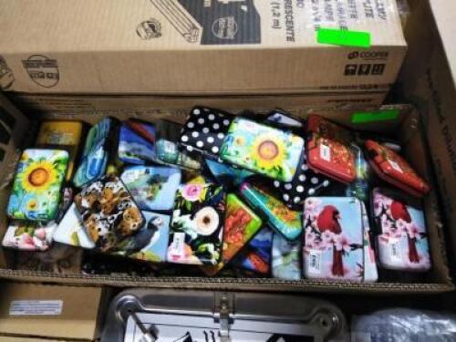 DESCRIPTION: (1) CASE OF APPROX (50) METAL WALLETS BRAND/MODEL: ARMORED WALLET INFORMATION: MANY DESIGNS QTY: 1