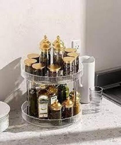 DESCRIPTION: (3) MULTI-FUNCTION ROTATING RACK INFORMATION: TRANSPARENT SIZE: 2 TIER RETAIL$: $25.17 EA QTY: 3
