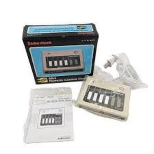 DESCRIPTION: (1) MINI REMOTE CONTROL CENTER BRAND/MODEL: RADIO SHACK #61-2677B RETAIL$: $20.00 EA QTY: 1