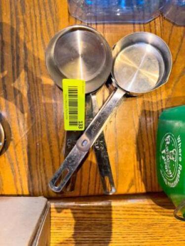 NAME: ASSORTED METAL MEASURING CUPS DESCRIPTION: ASSORTED METAL MEASURING CUPS LOCATION: MAIN DINING QTY: 1