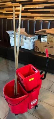 DESCRIPTION: MOP BUCKET WITH (2) MOPS LOCATION: DINING AREA QTY: 1