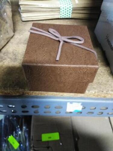 DESCRIPTION: (1) CASE OF (18) SMALL BROWN BOXES QTY: 1