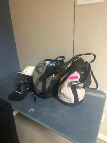 LACROSS HELMET WITH (2) LARGE BAGS OF BALLS