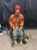 DESCRIPTION POISON PROPS WHEELCHAIR BOUND MALE ANIMATRONIC PROP. BRAND / MODEL: POISON PROPS WBM1051 ADDITIONAL INFORMATION PNEUMATICALLY POWERED. DOE - 3