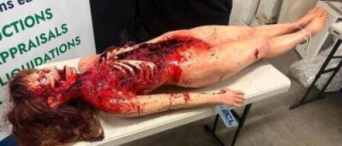DESCRIPTION RUBBER AUTOPSY PROP WOMAN W/ NO SKIN ON FACE. QTY 1