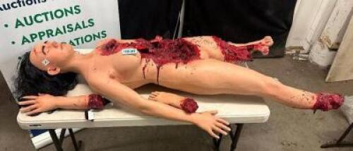 DESCRIPTION RUBBER AUTOPSY PROP NUDE WOMAN W/ MISSING LIMBS QTY 1