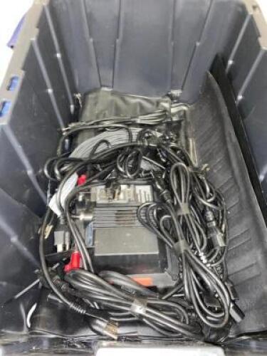 DESCRIPTION TOTE AND CONTENTS - ASSORTED POWER CORDS AND STEP DOWNS. THIS LOT IS: ONE MONEY QTY 1