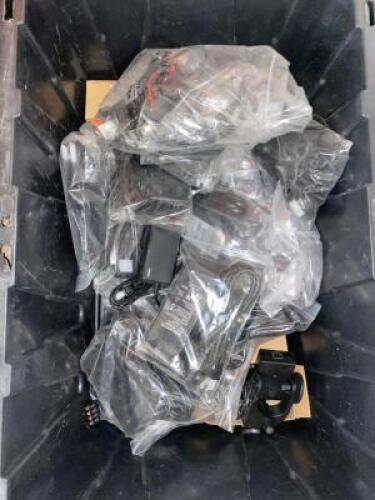 DESCRIPTION TOTE AND CONTENTS - ASSORTED POWER CORDS AND STEP DOWNS. THIS LOT IS: ONE MONEY QTY 1