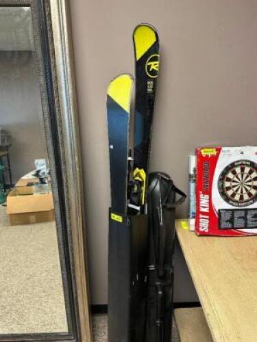 ROSIGNOL PARABOLIC SKIS W/ POLES AND TRAVEL CASE.