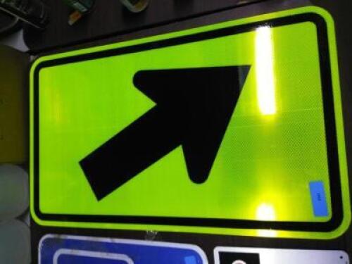 DESCRIPTION: (1) STREET SIGN WITH ARROW SIZE: ALUMINUM QTY: 1