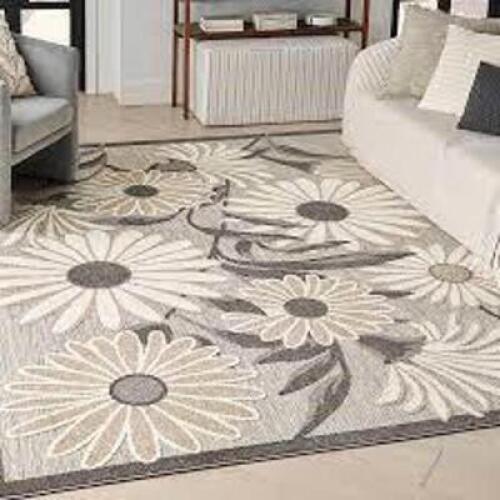 DESCRIPTION: (1) AREA RUG, INDOOR OR OUTDOOR BRAND/MODEL: NOURISON HOME INFORMATION: ALOHA SIZE: 7' X 10' RETAIL$: $151.04 EA QTY: 1